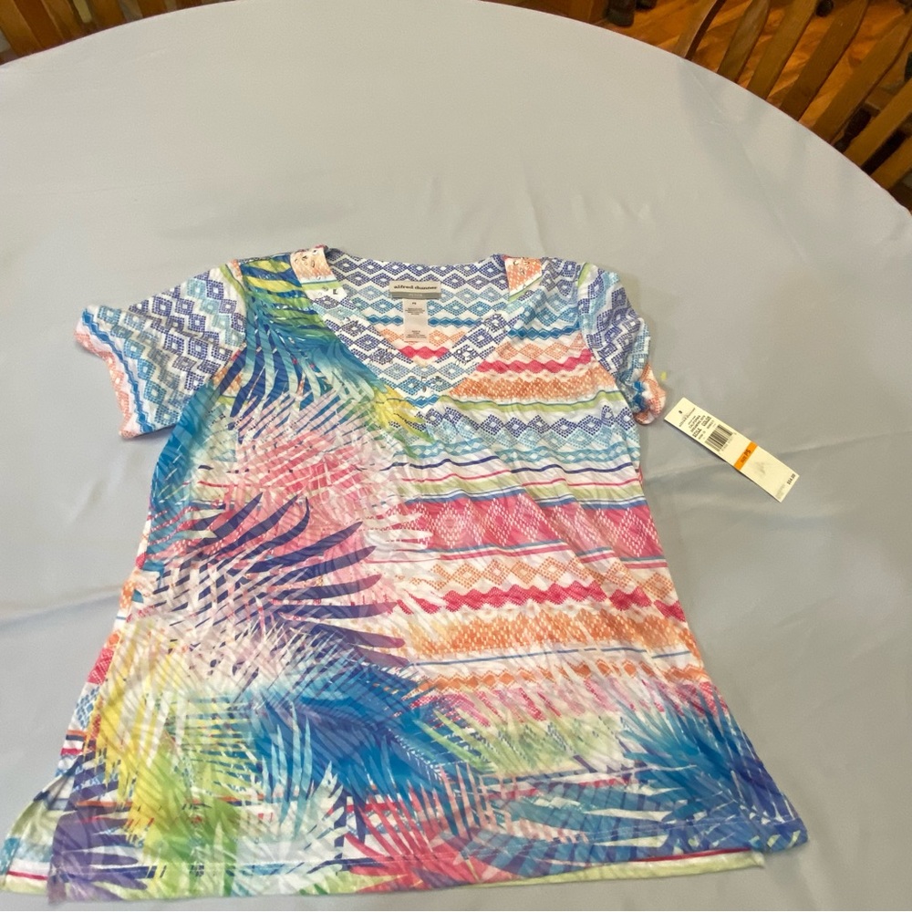 Alfred Dunner color splash PS shirt.  Neckline has silver embellishments